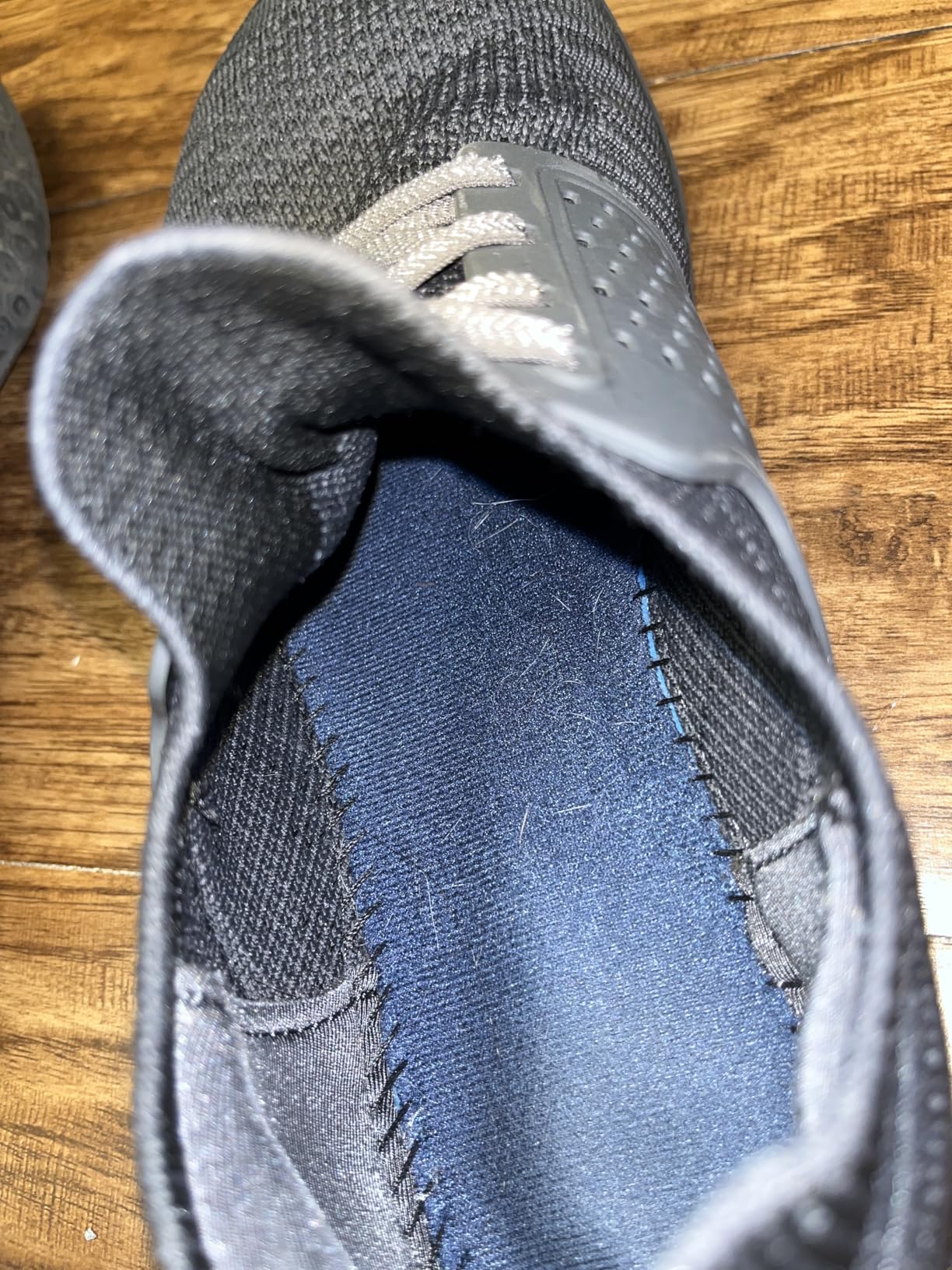 Side profile showing zero drop design and padded achilles collar of WHITIN minimalist sneakers